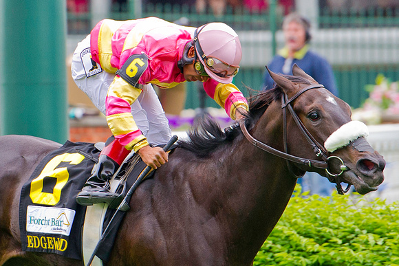 A Little Bit Sassy, Luis Saez aboard, wins the Edgewood Stakes on Kentucky Oaks day at Churchill Downs.