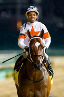 Cinco Charlie, Ricardo Santana Jr. up, wins the William Walker Stakes on Opening Night of the 2015 Spring Churchill Downs meet.