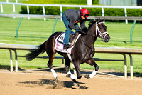 Eskenformoney, with exercise rider Ezequiel Perez, galloped a mile and one half in preparation for the Kentucky Oaks.