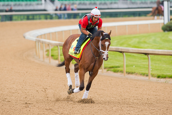 John Oxley’s Danzig Moon galloped 1 and 1/2 miles under exercise rider William Cano in preparation for the Kentucky Derby.