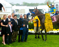 American Pharoah with Victor Espinoza aboard in the Preakness Cupola circle after winning the Xpressbet.com Preakness Stakes (GI) at Pimlico Race Course in Baltimore, Maryland.