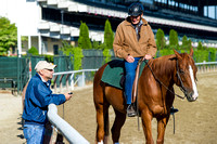 New York based trainers Tom Albertrani and Barclay Tagg share stories during morning exercises at Belmont Park in Elmont, New York.