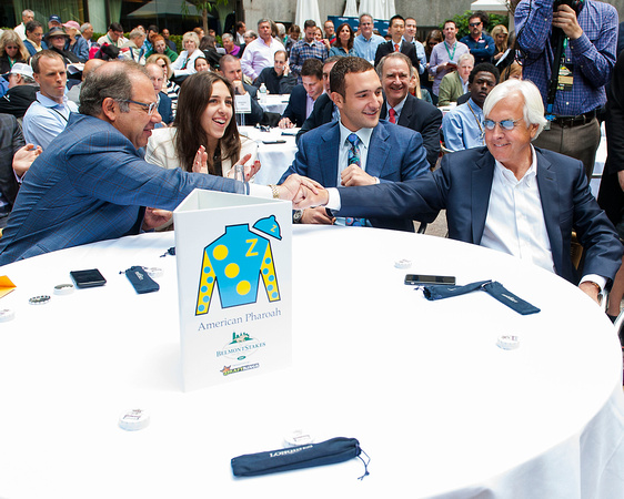 Ahmed Zayat and Bob Baffert celebrate drawing the five gate for the Belmont Stakes at the Belmont Stakes Post Draw in Rockefeller Center in Manhattan, New York.