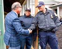 American Pharoah owner Ahmed Zayat introduces himself to NYRA Peace Officers at Belmont Park in Elmont, New York.