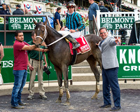 Cocked and Loaded, Irad Ortiz, Jr. aboard, trained by Larry Rivelli, in the winners' circle after winning the Tremont Stakes at Belmont Park in Elmont, New York.