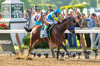 American Pharoah with Victor Espinoza up, wins the 147th Belmont Stakes (GI) and becomes the 12th Triple Crown winner at Belmont Park in Elmont, New York.