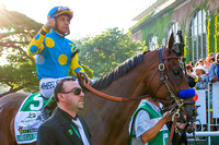 Victor Espinoza gives a thumbs up as American Pharoah walks to the track for the post parade before winning the 147th Belmont Stakes (GI) and becoming the 12th Triple Crown winner at Belmont Park in E