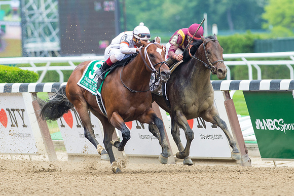 March, Irad Ortiz Jr. up, trained by Chad Brown, wins the Woody Stephens Stakes (GII) at Belmont Park in Elmont, New York.