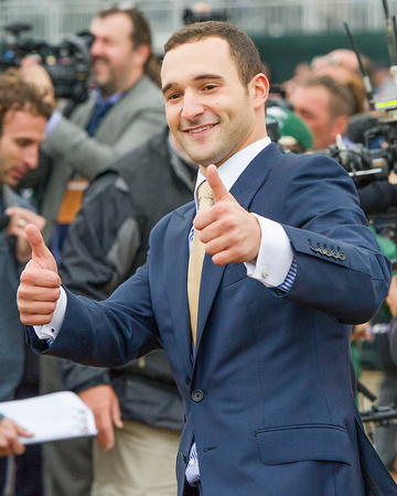 Justin Zayat gives the "thumbs up" after Triple Crown winner American Pharoah, ridden by Victor Espinoza, won the Breeders' Cup Classic (GI) and became the first "Grand Slam" champion.