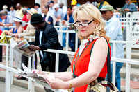 Scenes and fashions from Belmont Stakes day at Belmont Park.