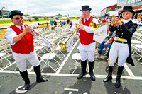 Sam Grossman, Ryan Resky, Bethann Dixon play for the fans on Black Eyed Susan Day at Pimlico Race Course in Baltimore, Maryland.