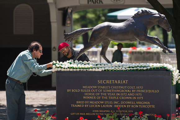 The traditional blanket of carnations is attached to the Secretariat statue in the Belmont Park paddock.