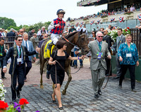 Carina Mia, with Julien Leparoux up, walks Victory Lane after winning the Grade I Acorn Stakes at Belmont Park in Elmont, New York.