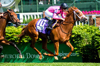 Catch A Glimpse, ridden by Florent Geroux, trained by Mark Casse, wins the Edgewood Stakes at Churchill Downs in Louisville, Kentucky.