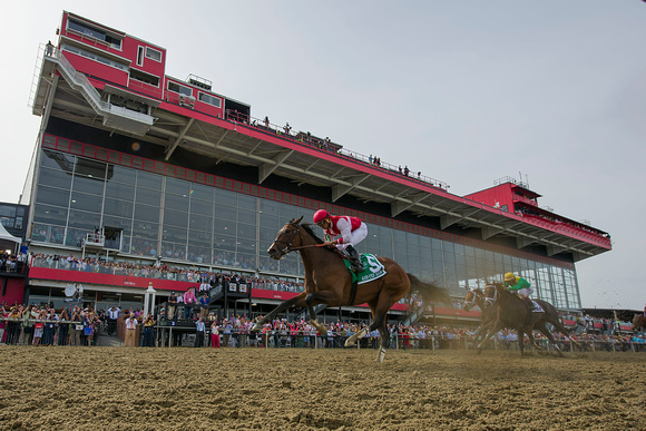 Go Maggie Go, Luis Saez up, trained by Dale Romans, wins the GII Black Eyed Susan stakes at Pimlico Race Course in Baltimore, Maryland.
