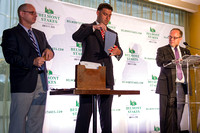 Stakes Coordinator Andrew Byrnes (left), Assistant Racing Secretary Sean Pearl (center), and Track Announcer Larry Collmus (right), draw the Belmont Stakes contender post positions at the Belmont Stak