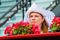 Hats and fashions on Black Eyed Susan day at Pimlico Race Course in Baltimore, Maryland.