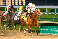 Cinco Charlie, Ricardo Santana Jr. up, wins the William Walker Stakes on Opening Night of the 2015 Spring Churchill Downs meet.