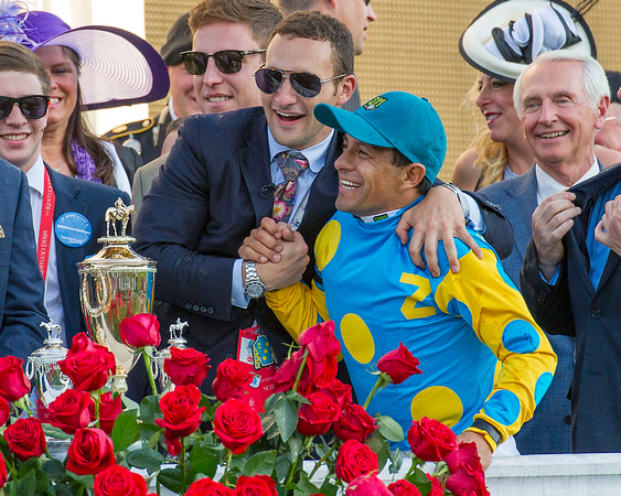 Justin Zayat, Zayat Stables' Manager, celebrates with Victor  Espinoza in the winners' circle after American Pharoah captured the Kntucky Derby (Gi) at Churchill Downs in Louisville, Kentucky.