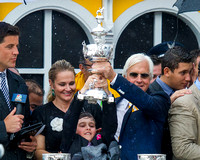 Bob Baffert and his son Bode hoist the Preakness trophy high after winning the Xpressbet.com Preakness Stakes (GI) aboard American Pharoah at Pimlico Race Course in Baltimore, Maryland.