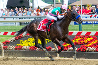 Fame and Power, Martin Garcia up, wins the 2015 Sir Barton Stakes at Pimlico Race Course in Baltimore, Maryland.