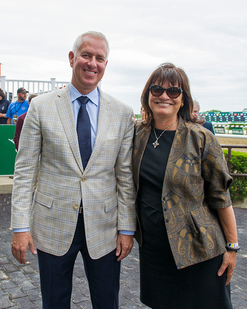 Trainer Todd Pletcher and Stonestreet Farms owner Barbara Banke at Belmont Park smile after winning the True North Handicap (GII) with Rock Fall.