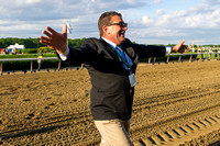 Assistant trainer Jimmy Barnes celebrates after American Pharoah won the 147th Belmont Stakes (GI) and became the 12th thoroughbred race horse to win the Triple Crown.