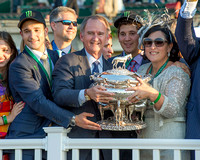 Justin Zayat, NYRA CEO Chris Kay and Joanne Zayat celebrate in the winners' circle after American Pharoah won the 147th Belmont Stakes (GI) and became the 12th thoroughbred race horse to win the Tripl