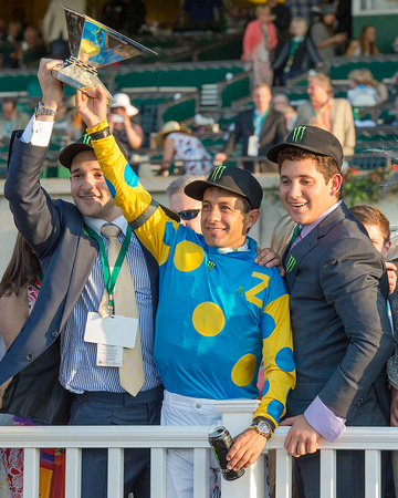 Justin Zayat and Victor Espinoza, celebrate in the winners' circle after American Pharoah won the 147th Belmont Stakes (GI) and became the 12th thoroughbred race horse to win the Triple Crown.