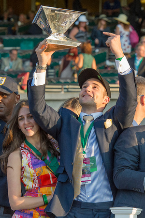 Justin Zayat celebrates in the winners' circle after American Pharoah won the 147th Belmont Stakes (GI) and became the 12th thoroughbred race horse to win the Triple Crown.