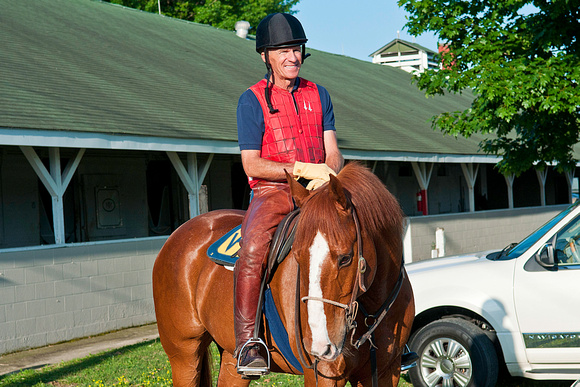 Michael Matz prepares to escort Kentucky Derby 138 contender Union Rags to the track for a morning jog.