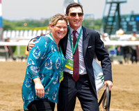 Assistant Trainers Leana Willaford and Rodolphe Brissette are all smiles after Carina Mia, with Julien Leparoux up and trained by Bill Mott, wins the Grade I Acorn Stakes at Belmont Park in Elmont, Ne