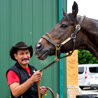 "Coach" Satire and his groom "Cowboy" at Pimlico Race Course in Baltimore, Maryland.