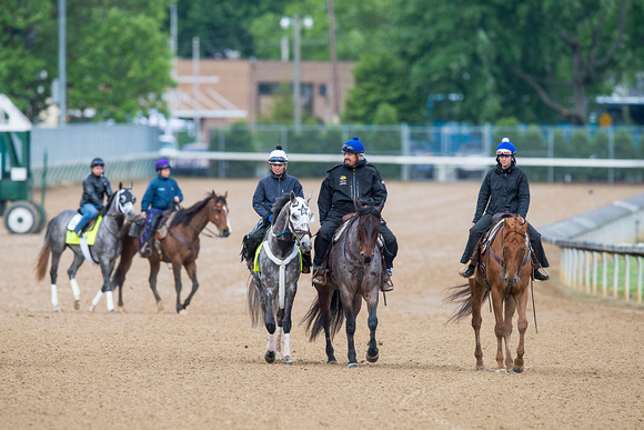 Scenes from morning workouts at Churchill Downs in Louisville, Kentucky.