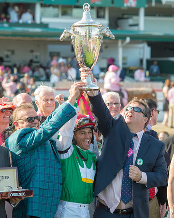 Trainer John Servis (left), Jockey Javier Castellano (center) and Cash is King Stables owner Chuck Zacney celebrate after winning the 142nd running of the Kentucky Oaks at Churchill Downs in Louisvill