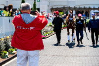 Ken Ramsey, owner of Kentucky Derby contender Oscar Nominated, takes a picture in the paddock at Churchill Downs in Louisville, Kentucky.
