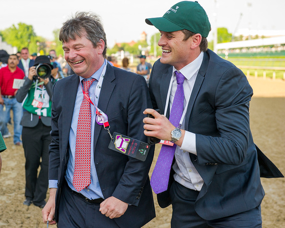 Assistant Trainer Jack Sisterton celebrates with connections after Nyquist with Mario Gutierrez aboard, won the 142nd Kentucky Derby at Churchill Downs in Louisville, Kentucky.