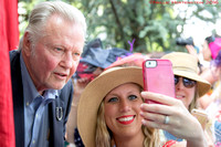 Actor Jon Voigt takes a selfie with a fan during the Red Carpet arrivals at the Kentucky Derby at Churchill Downs in Louisville, Kentucky.