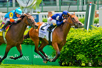 Coffee Clique, Javier Castellano aboard, wins the Churchill Distaff Turf Mile stakes.