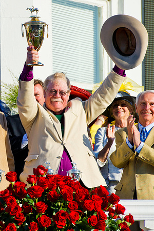 California Chrome owner Steve Coburn celebrates a victory in the 140th Kentucky Derby.